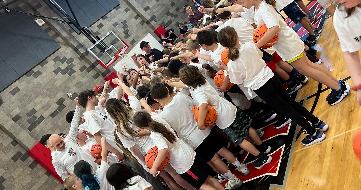 Basketball Camp kids huddle